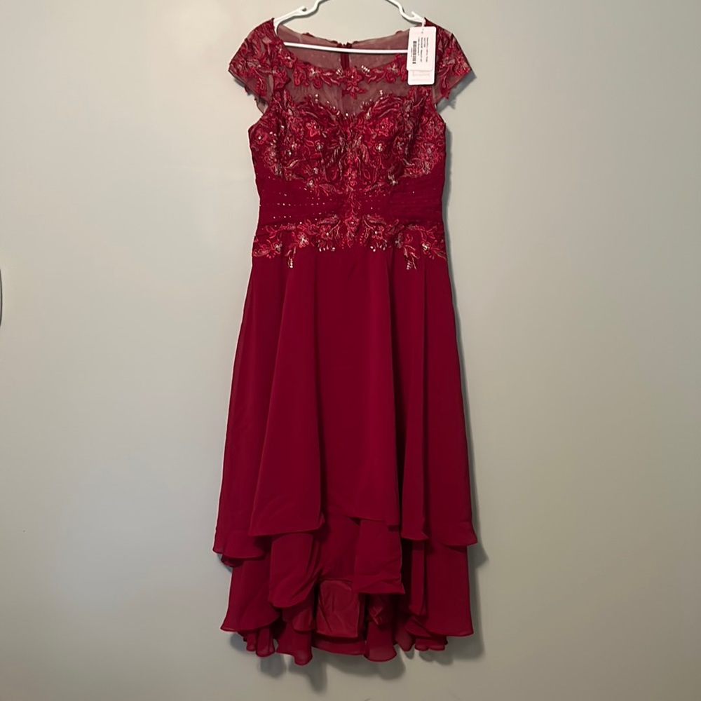 Jj house formal gown new with tags size 12. Burgundy with lace